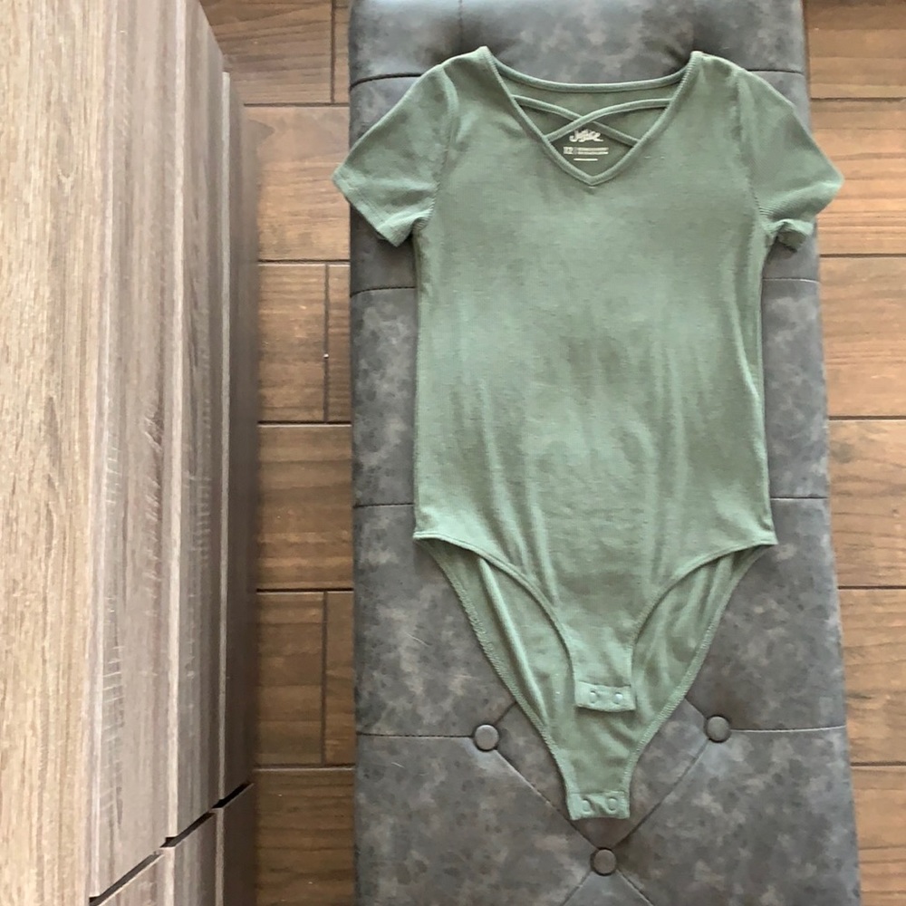 Green Justice one piece. Only worn a few times.